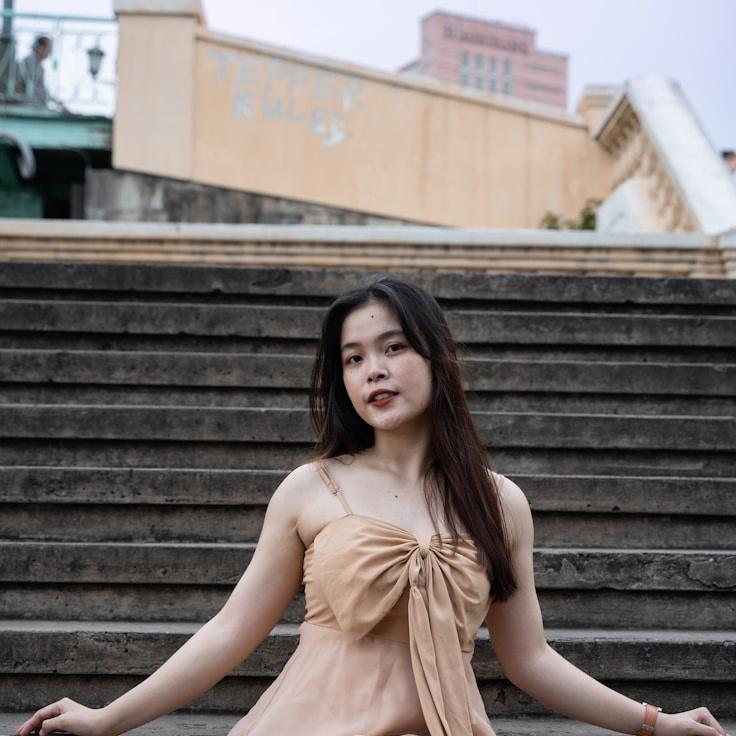 Kaveri Mehta, Lead Design Curator at Haven Glade Crest, reviewing corporate floral arrangements